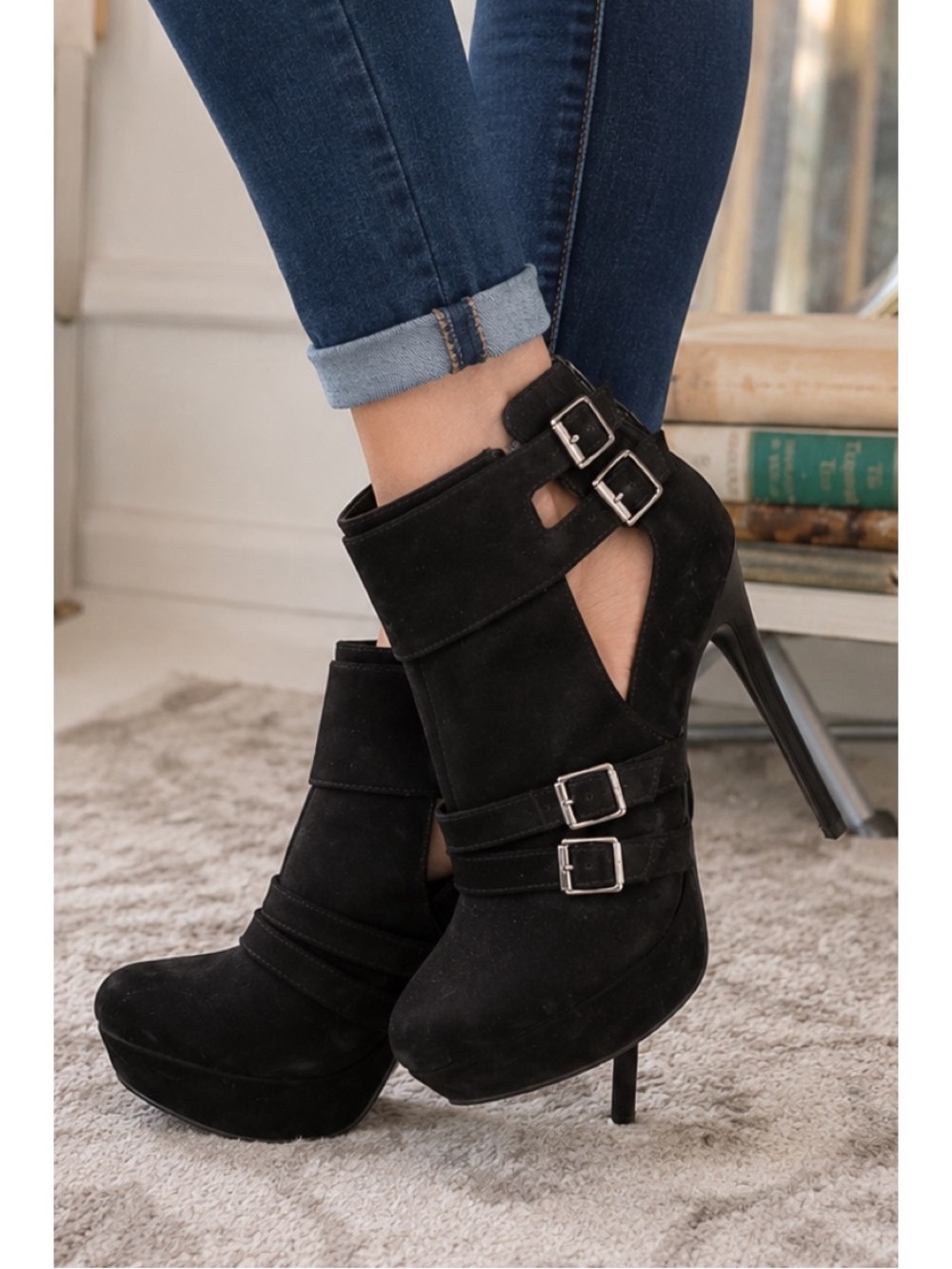 Deb black suede ankle booties featuring a bold platform sole, high stiletto heel